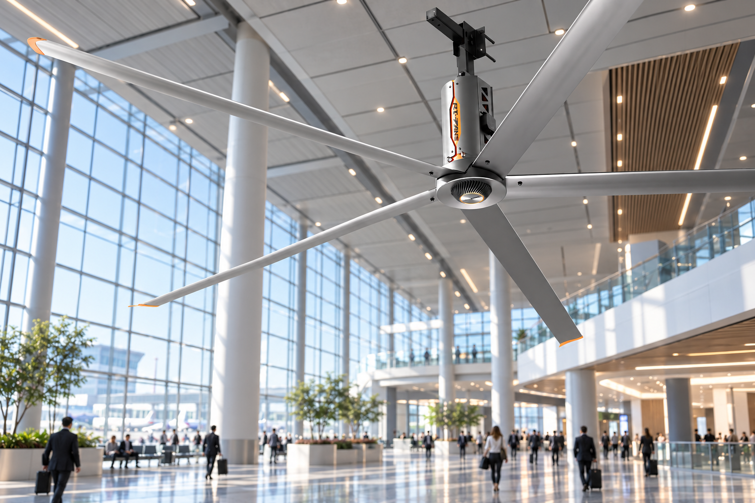 HVLS fan providing airflow in a modern transit hall