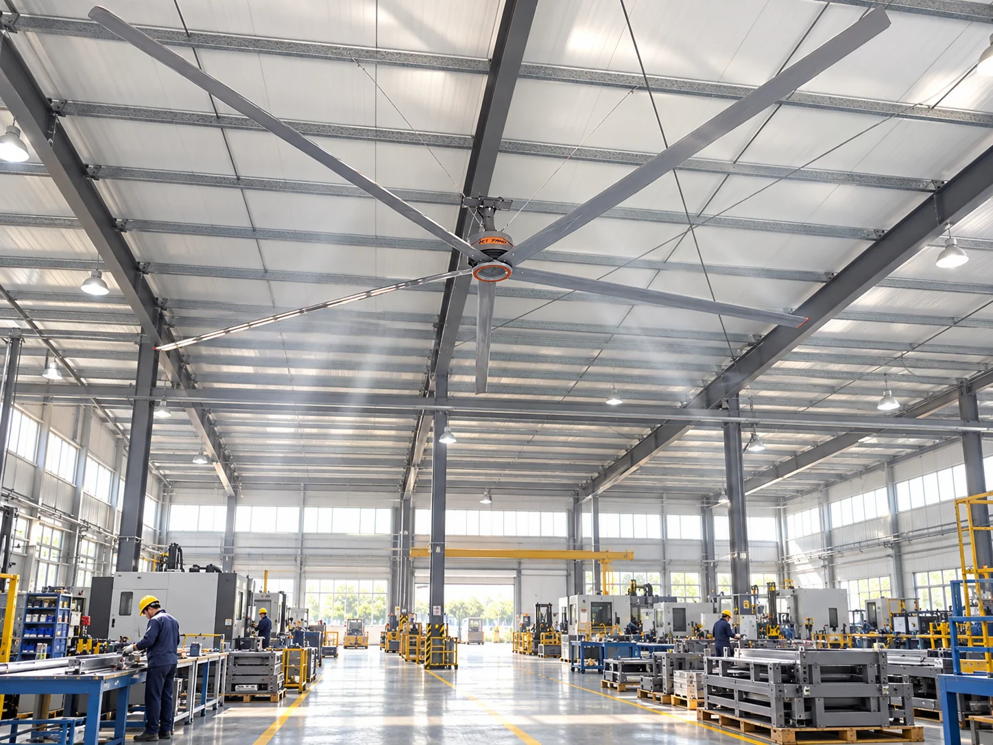 RTFANS five-blade HVLS fan above organized manufacturing workstations