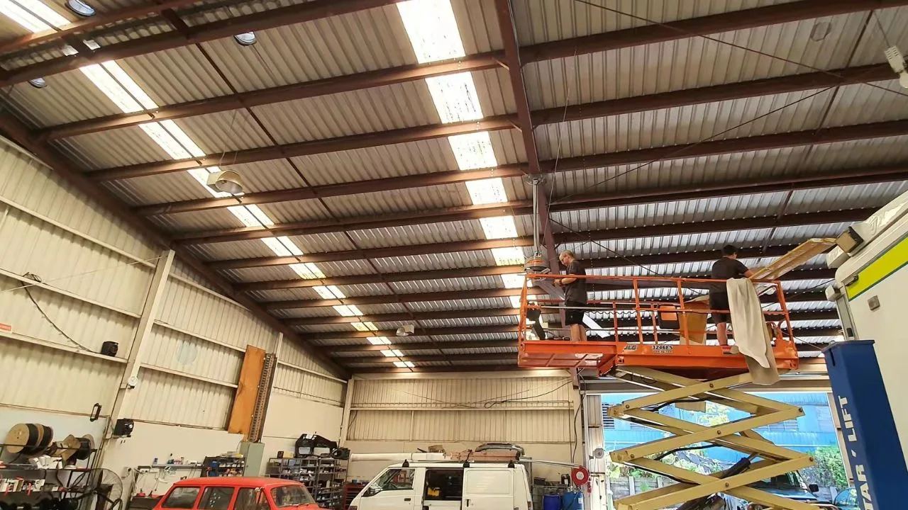 Commercial ceiling fan in a bright indoor facility