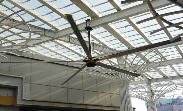 Large ceiling fan supporting ventilation and reducing heat in sport halls.