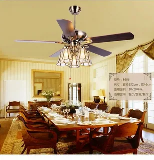 Decorative ceiling fan in dining space improving comfort while saving energy.