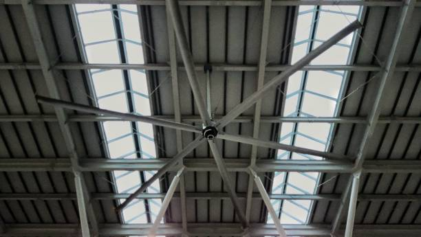HVLS ceiling fan maintaining airflow in crowded sport halls during events.